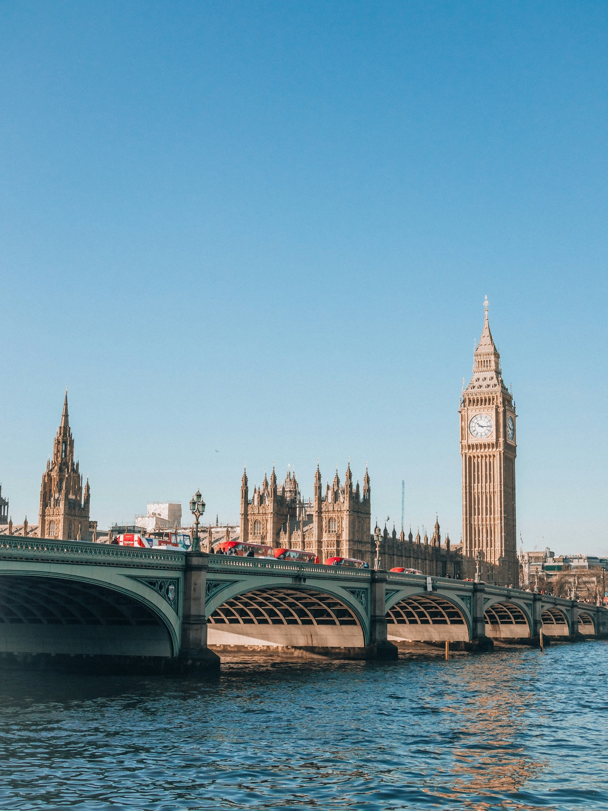 the big ben clock tower towering over the city of london