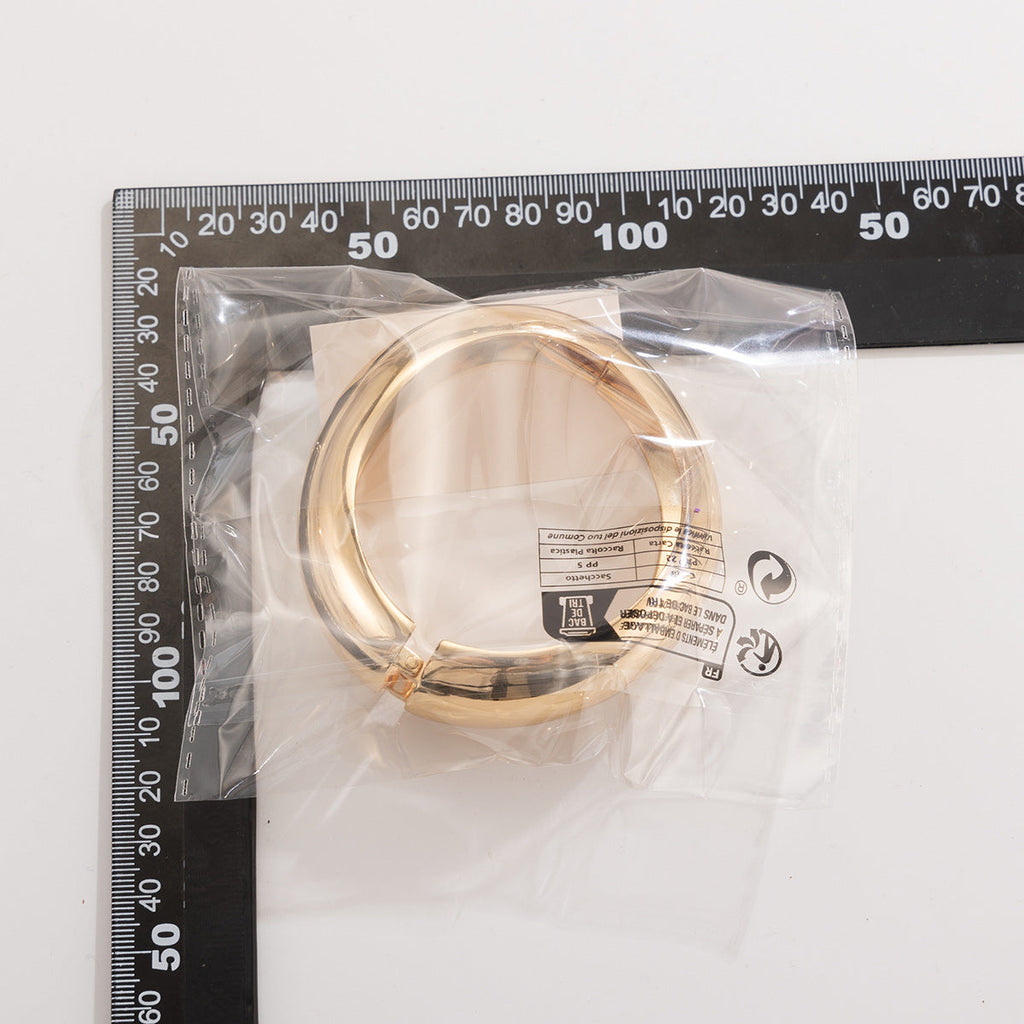 Metallic Teardrop Spring Bangle