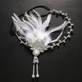 Rhinestone Feather Headpiece – Festive Glam Accessory