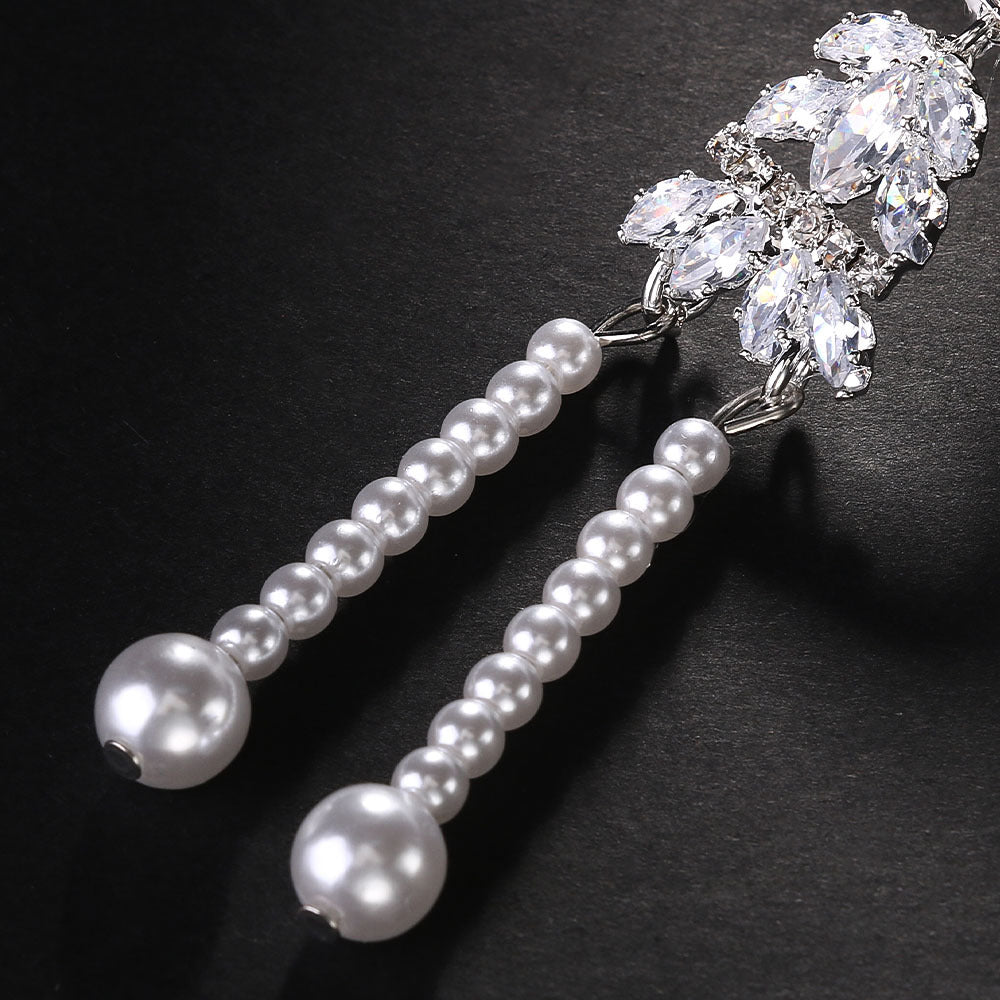 Rhinestone Feather Headpiece – Festive Glam Accessory